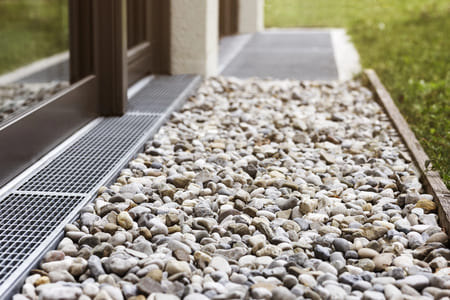 French drain vs channel drains choosing the right fix for your soggy calhoun lawn